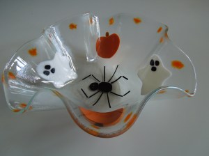 Wavy bowl featuring the best of Halloween - Ghosts, Pumpkins, and a Giant Spider
